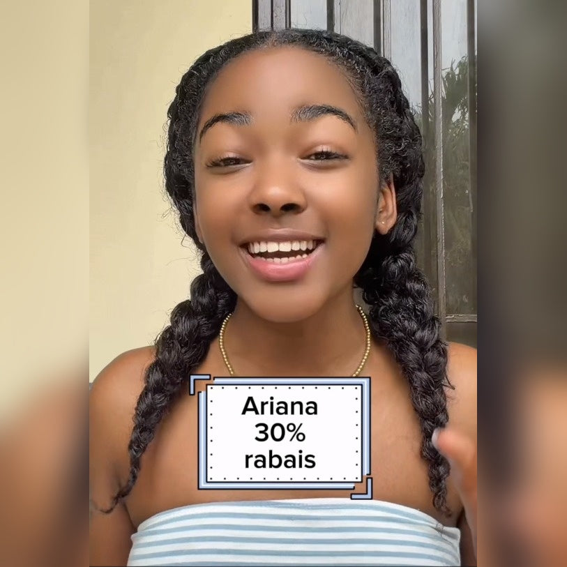 Ariana with braided hair smiling, with a text overlay indicating a discount.